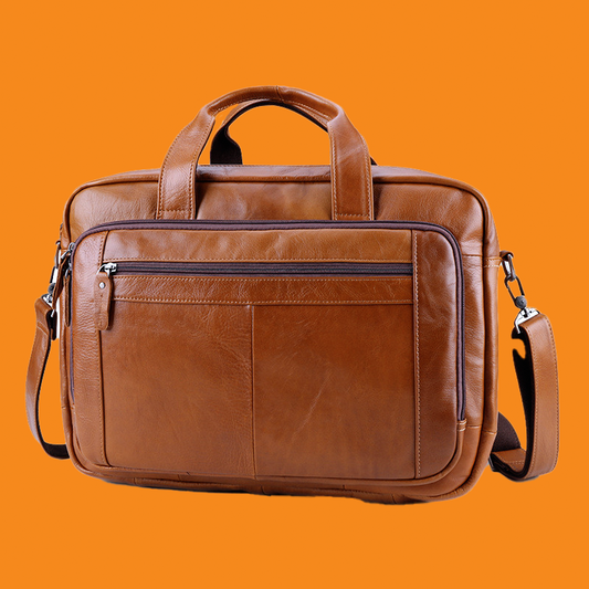 Brown leather briefcase on an orange background