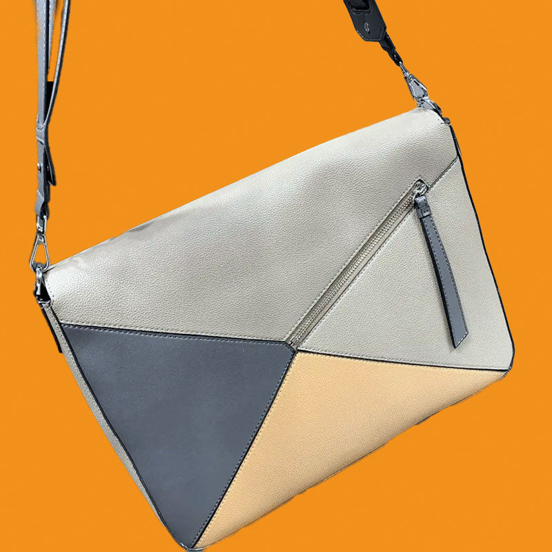 Geometrically designed handbag with a mix of beige, gray, and white on an orange background