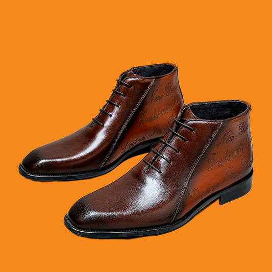 Brown leather boots with black laces on an orange background