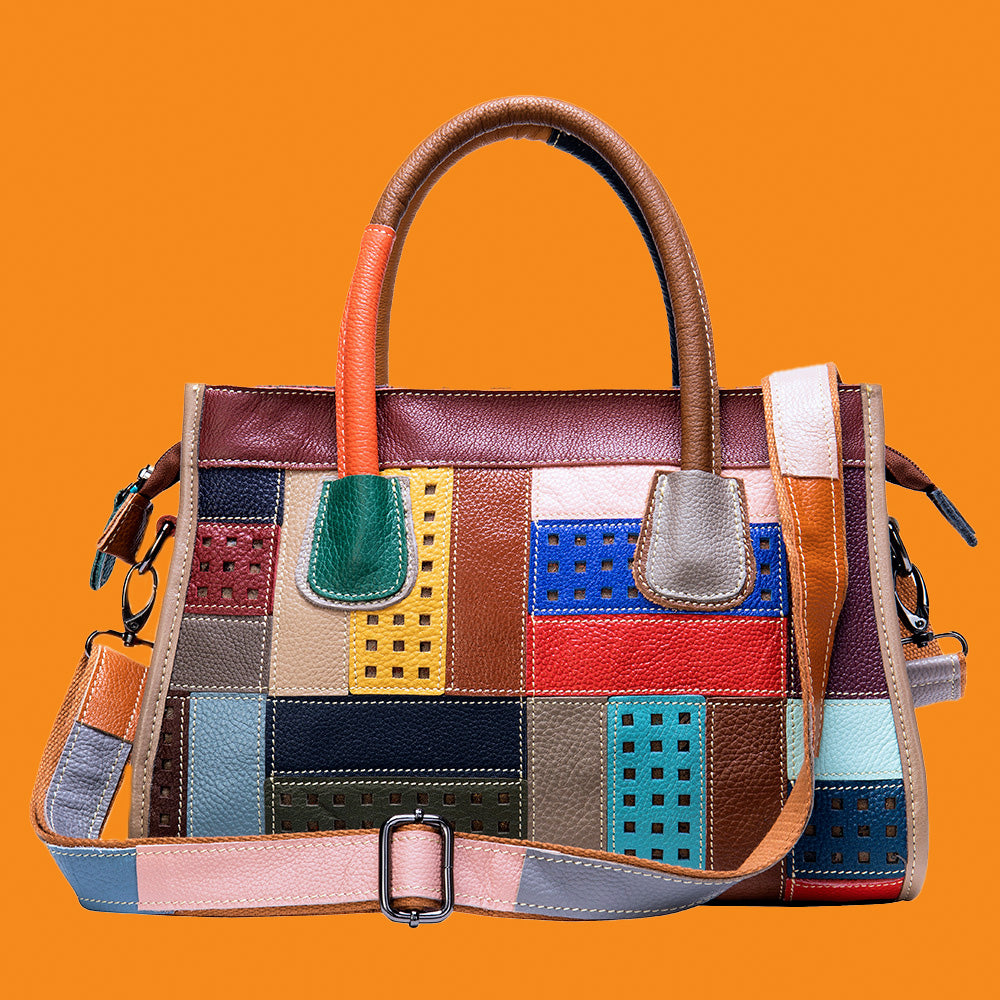 Multicolored patchwork handbag on an orange background