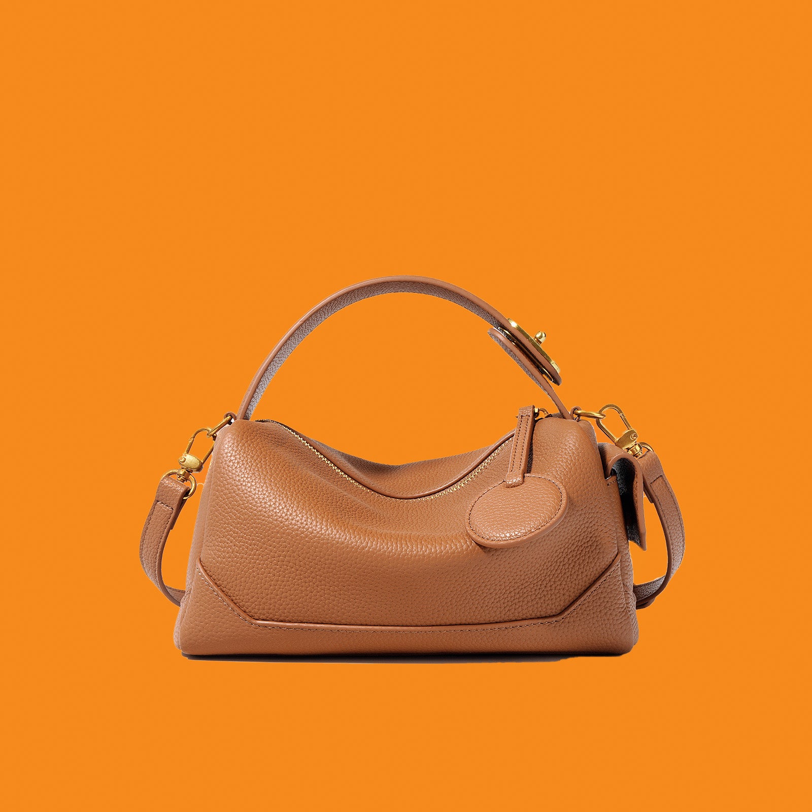 Brown handbag on an orange background