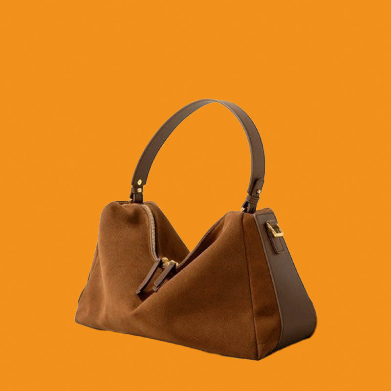 Brown handbag on an orange background