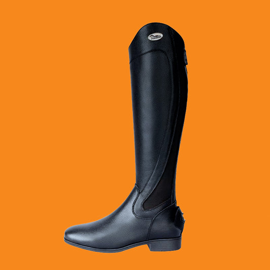 Black riding boot on an orange background