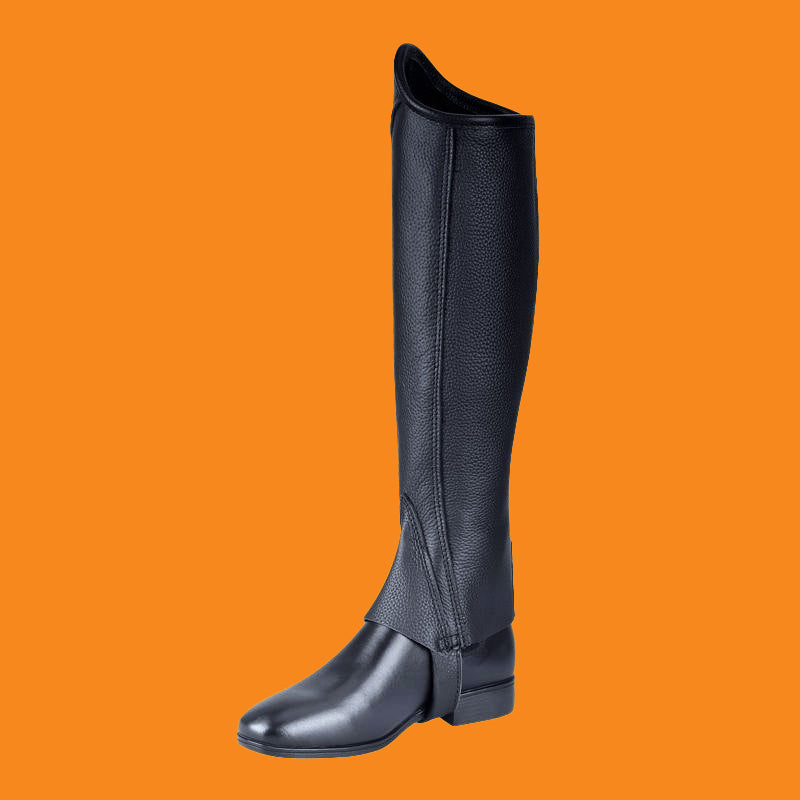 Black riding boot with gaiter on an orange background