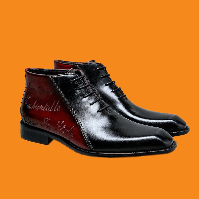 Black leather boots with red inner lining on an orange background