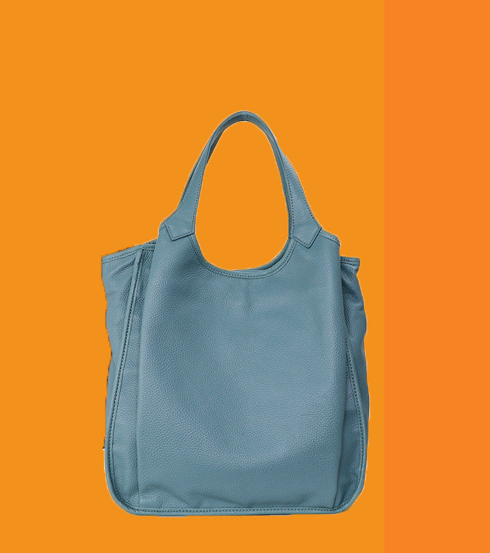 Blue tote bag on an orange background