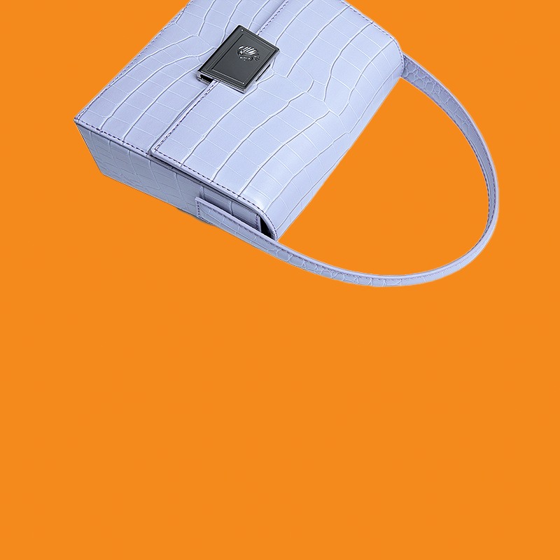 Light blue textured handbag on an orange background