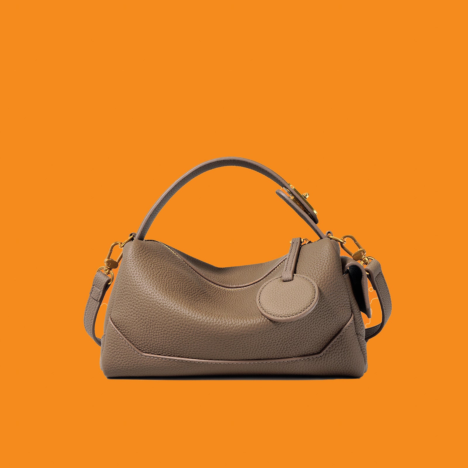 Brown handbag on an orange background