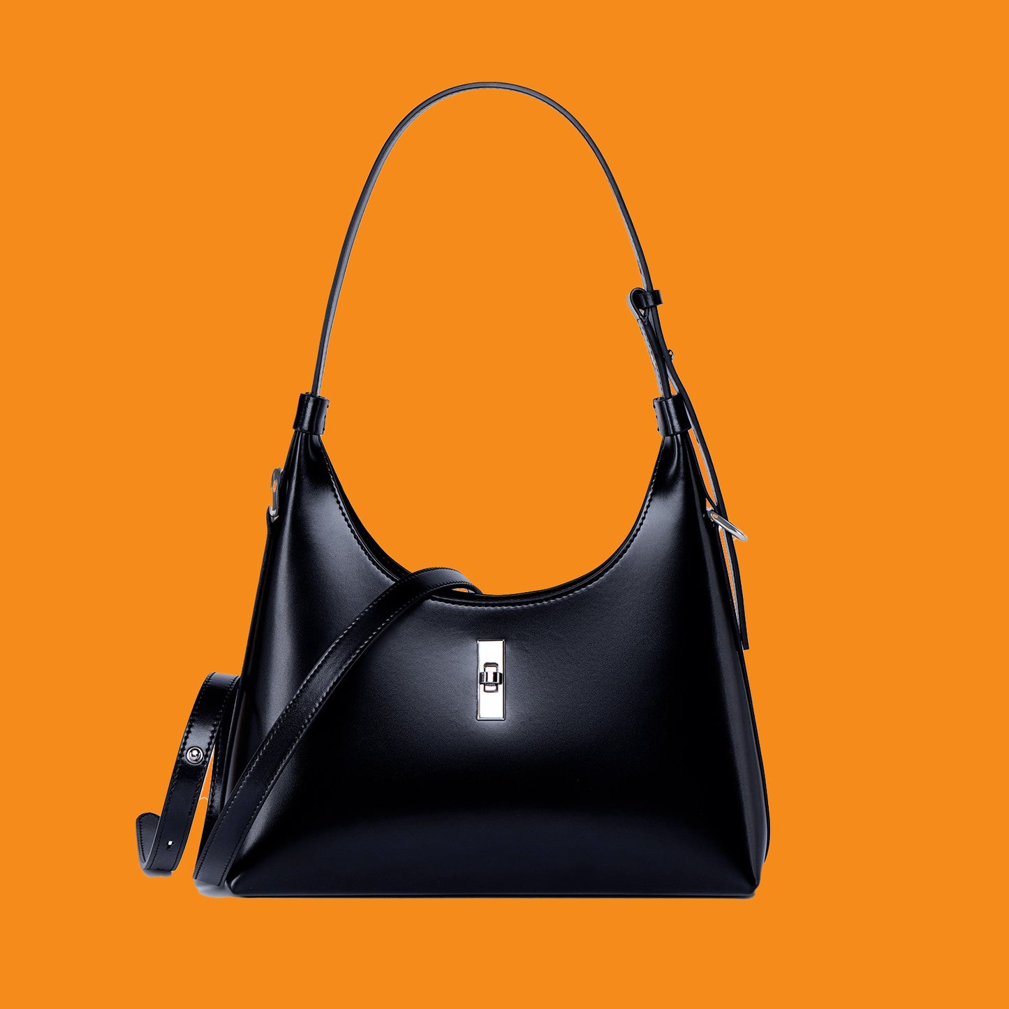 Black handbag on an orange background