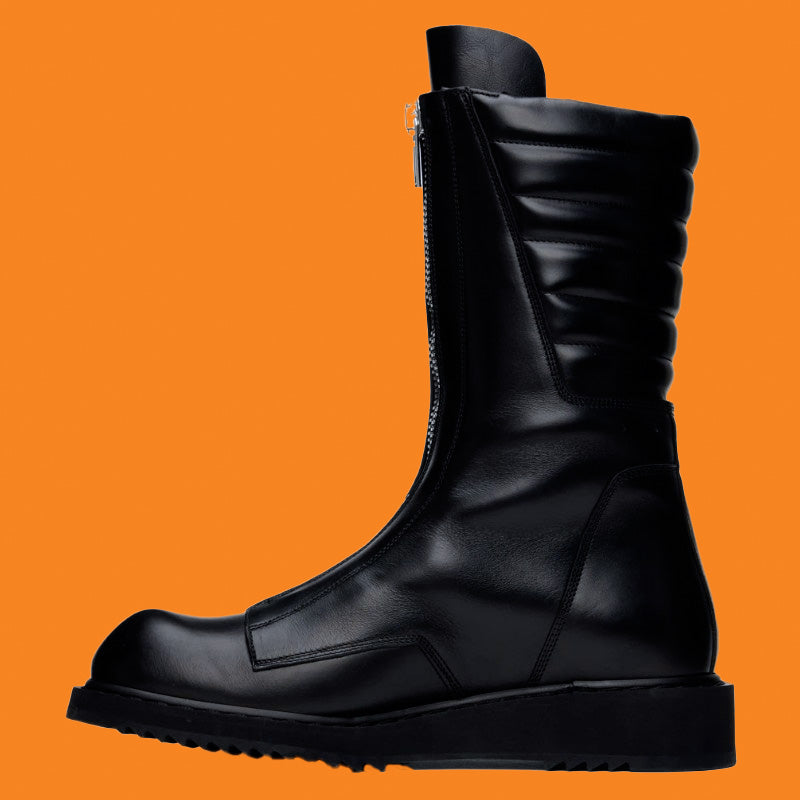 Black boot on an orange background